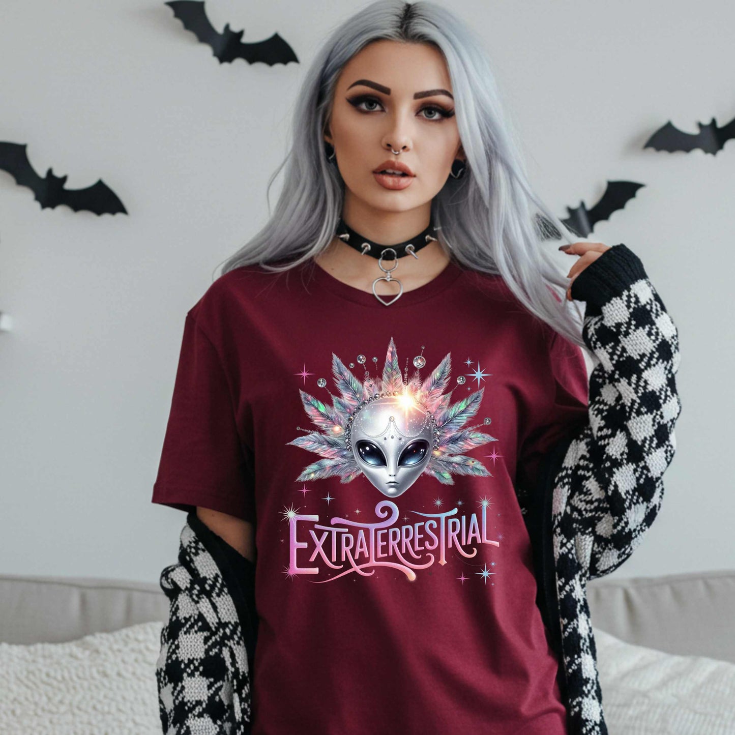 Calling all celestial divas—this Extraterrestrial alien graphic tee is giving big space energy and intergalactic glam. Featuring a radiant alien queen with jeweled head bling, pastel feathers, and more attitude than a Mercury in retrograde meltdown, this shirt is perfect for Halloween, sci-fi fans, and anyone who knows they weren’t meant for Earth’s nonsense.