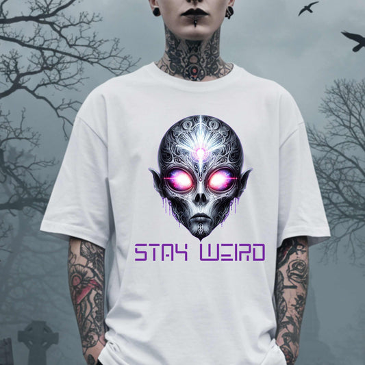 This Stay Weird alien shirt is for the cosmic misfits, the night-dwellers, and the ones who don’t just embrace their weirdness—they glorify it. Featuring a hauntingly detailed alien face with glowing eyes and third-eye vibes, this tee is equal parts spooky, surreal, and unapologetically bold.