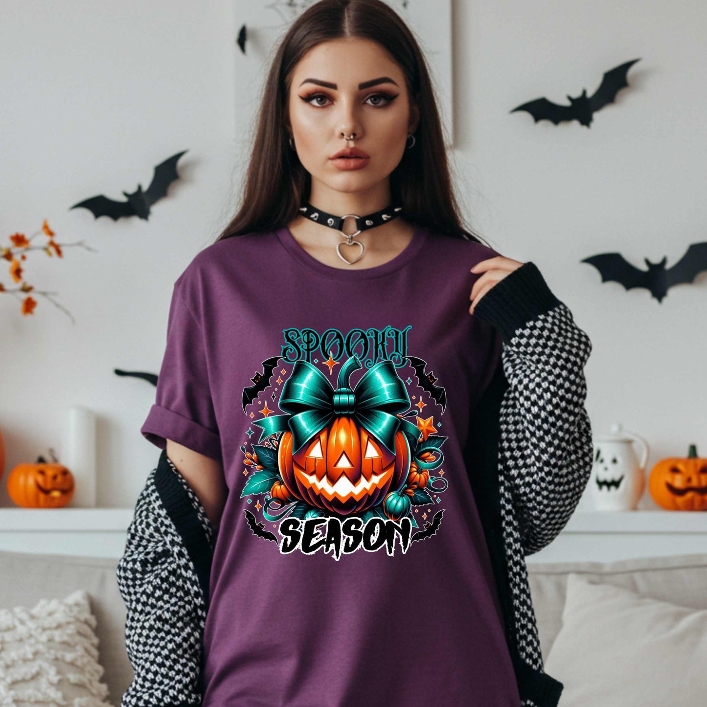 Step aside basic witches, this pumpkin came to SLAY. Our Spooky Season tee brings the perfect mix of creepy and cute—featuring a fierce jack-o’-lantern crowned with a bold teal bow and surrounded by gothic glam accents.