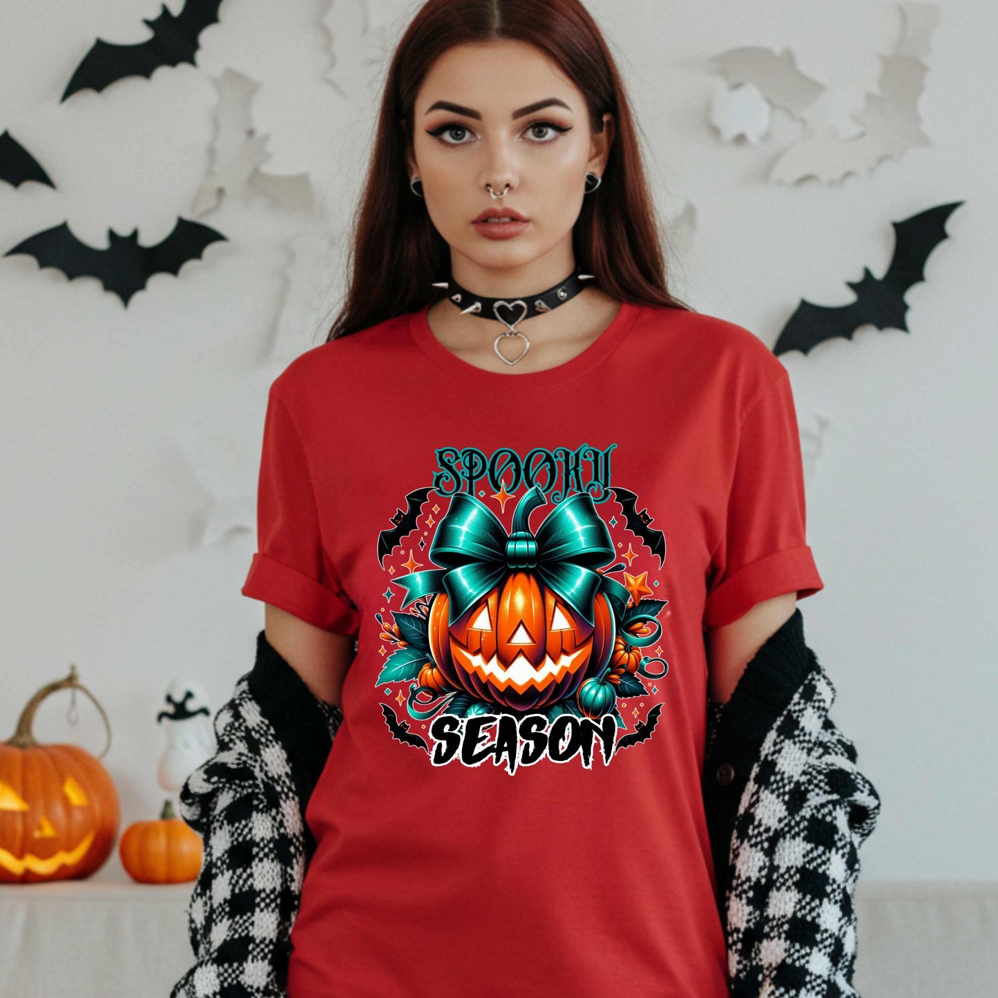 Step aside basic witches, this pumpkin came to SLAY. Our Spooky Season tee brings the perfect mix of creepy and cute—featuring a fierce jack-o’-lantern crowned with a bold teal bow and surrounded by gothic glam accents.