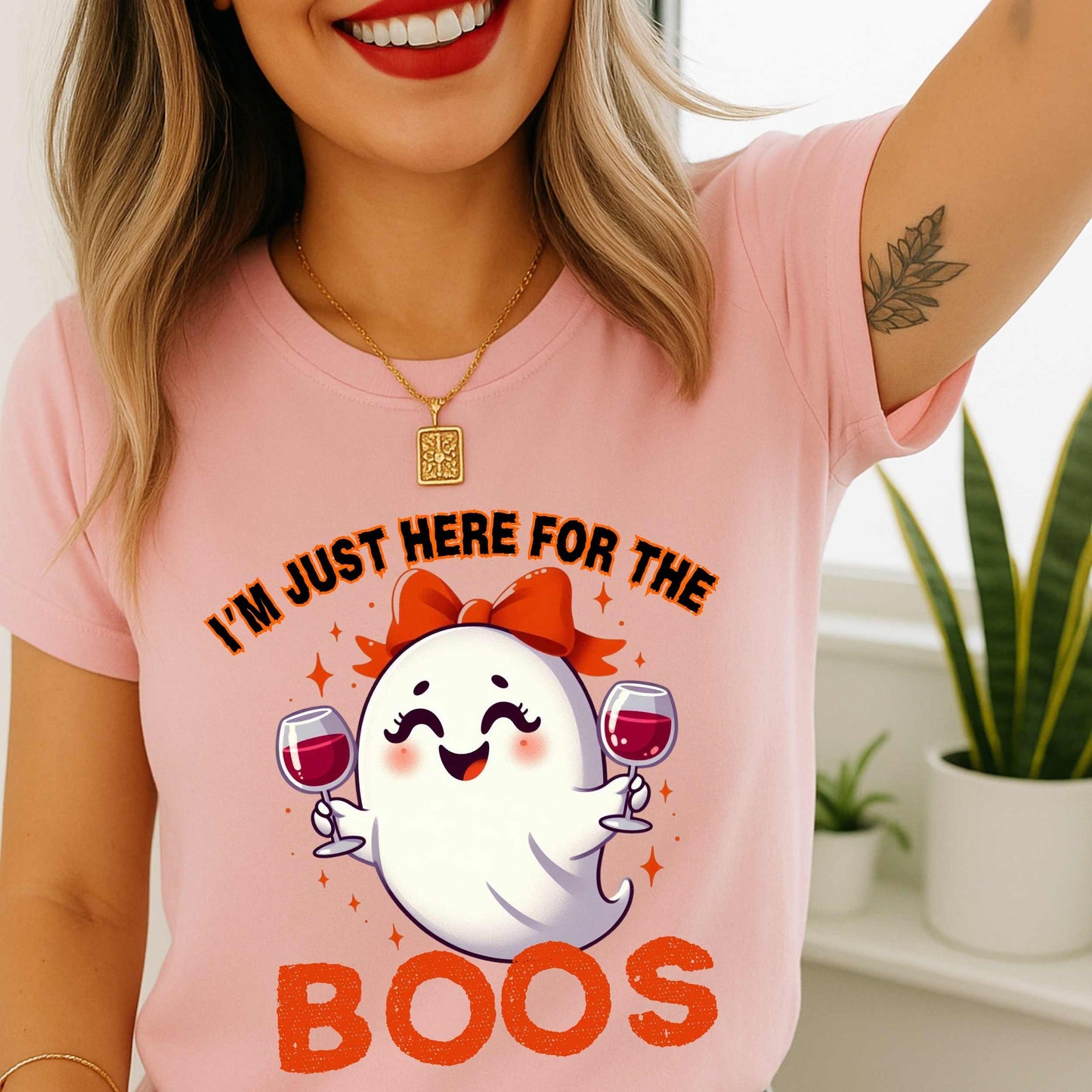 This hilarious “I’m Just Here for the Boos” tee features a bubbly little ghost with a bow, two glasses of red in hand, and zero shame in her sip game. She’s classy, a little sassy, and probably on her third pour. Perfect for Halloween parties, girls’ nights, wine tastings, or just pretending your spooky spirit isn’t fueled entirely by cabernet.