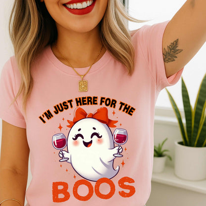 This hilarious “I’m Just Here for the Boos” tee features a bubbly little ghost with a bow, two glasses of red in hand, and zero shame in her sip game. She’s classy, a little sassy, and probably on her third pour. Perfect for Halloween parties, girls’ nights, wine tastings, or just pretending your spooky spirit isn’t fueled entirely by cabernet.
