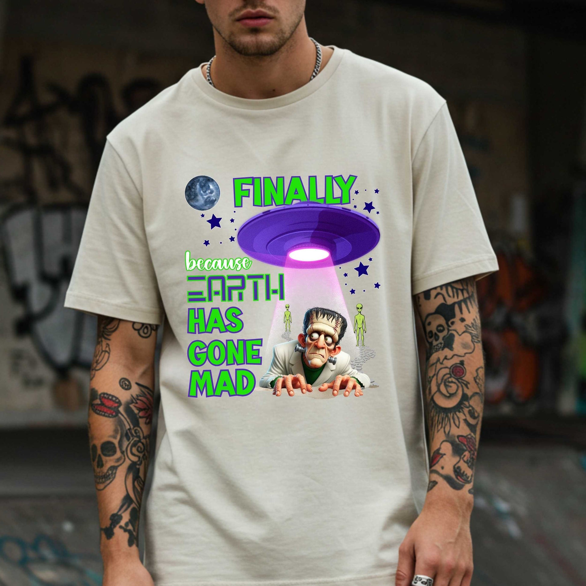 This funny alien Halloween shirt is for anyone who’s ever looked around and said, “Yeah, I’m done here.” Featuring a fed-up Frankenstein getting beamed up by a UFO (finally!), this sarcastic tee says what we’re all thinking: Earth has gone mad, and space is starting to look like a vibe. Perfect for Halloween parties, socially exhausted introverts, or anyone who’d prefer intergalactic drama over Earth’s nonsense. 