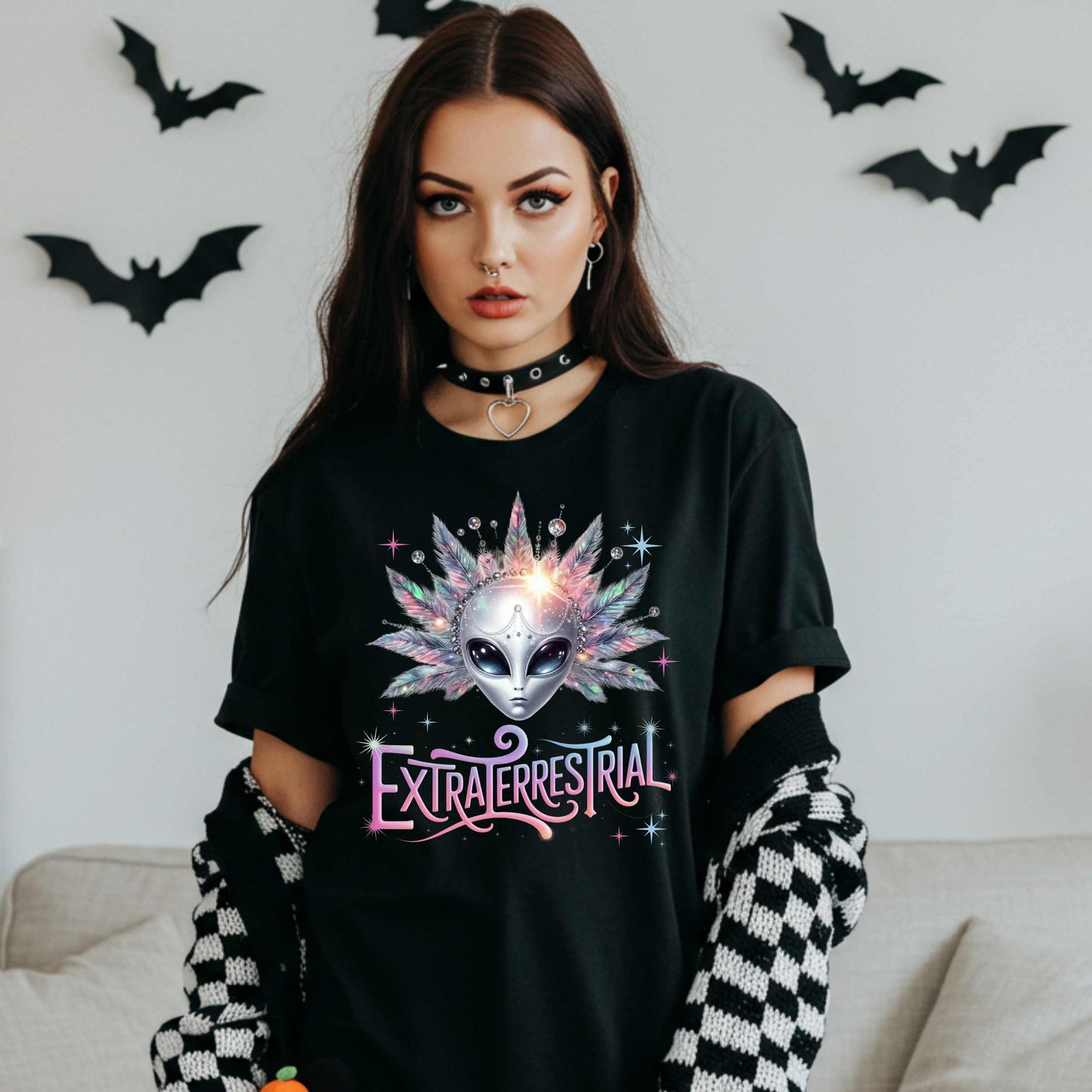 Calling all celestial divas—this Extraterrestrial alien graphic tee is giving big space energy and intergalactic glam. Featuring a radiant alien queen with jeweled head bling, pastel feathers, and more attitude than a Mercury in retrograde meltdown, this shirt is perfect for Halloween, sci-fi fans, and anyone who knows they weren’t meant for Earth’s nonsense. 