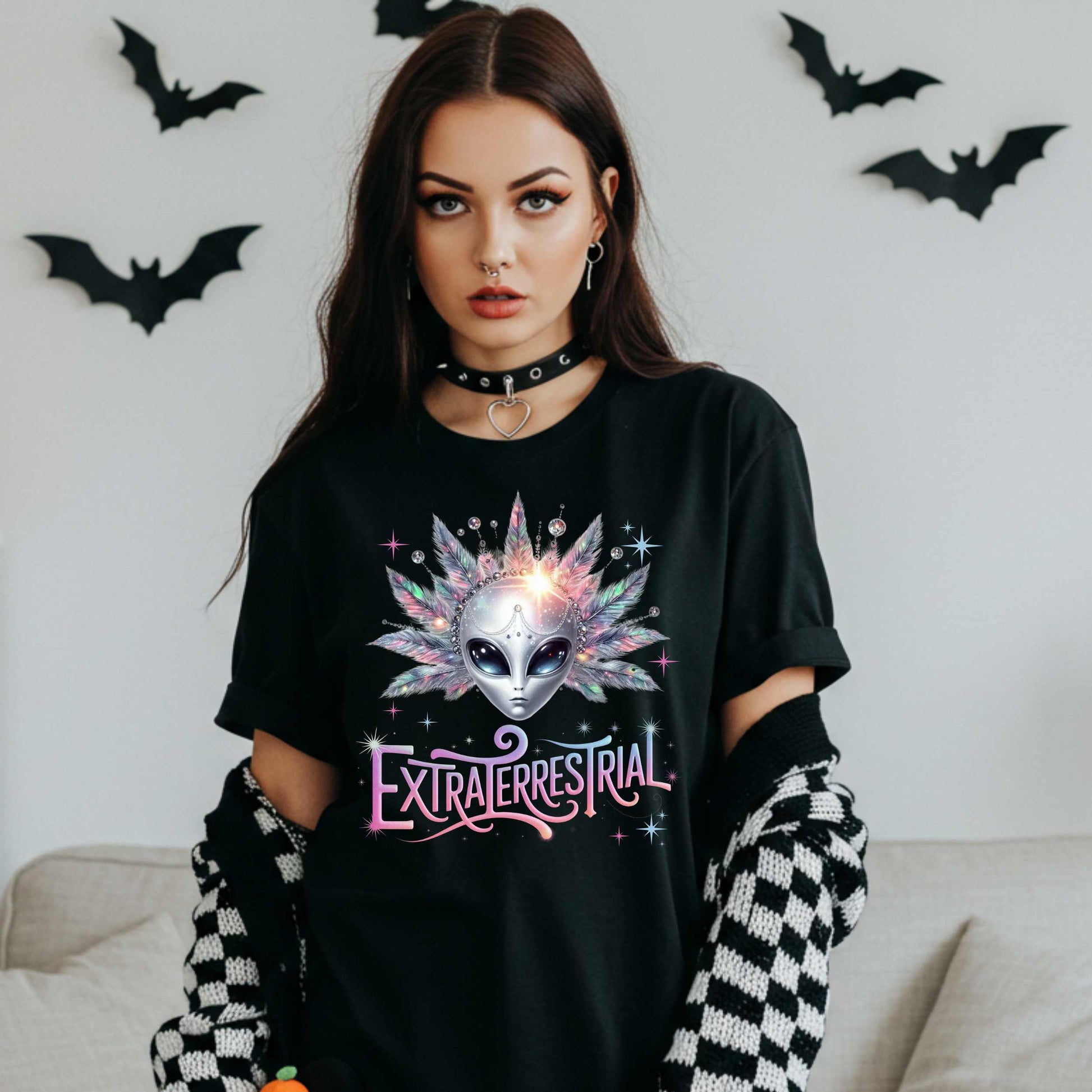 Calling all celestial divas—this Extraterrestrial alien graphic tee is giving big space energy and intergalactic glam. Featuring a radiant alien queen with jeweled head bling, pastel feathers, and more attitude than a Mercury in retrograde meltdown, this shirt is perfect for Halloween, sci-fi fans, and anyone who knows they weren’t meant for Earth’s nonsense. 