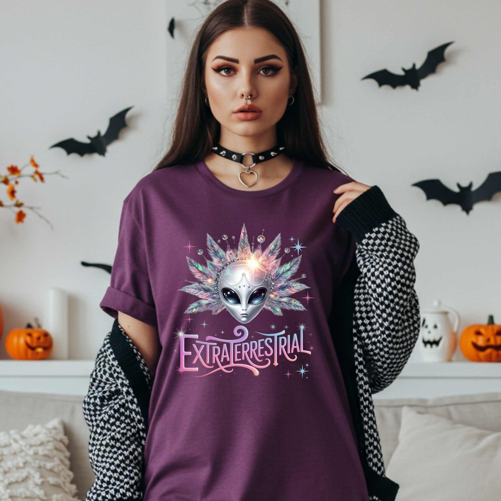 Calling all celestial divas—this Extraterrestrial alien graphic tee is giving big space energy and intergalactic glam. Featuring a radiant alien queen with jeweled head bling, pastel feathers, and more attitude than a Mercury in retrograde meltdown, this shirt is perfect for Halloween, sci-fi fans, and anyone who knows they weren’t meant for Earth’s nonsense. 