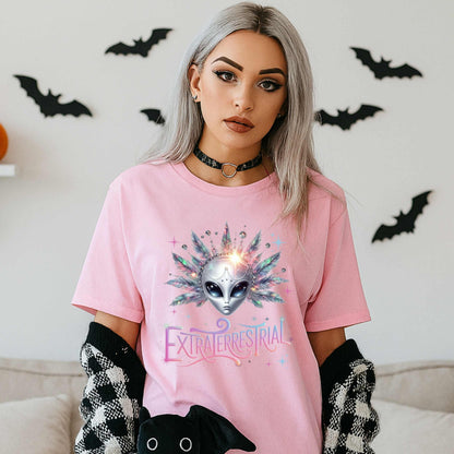 Calling all celestial divas—this Extraterrestrial alien graphic tee is giving big space energy and intergalactic glam. Featuring a radiant alien queen with jeweled head bling, pastel feathers, and more attitude than a Mercury in retrograde meltdown, this shirt is perfect for Halloween, sci-fi fans, and anyone who knows they weren’t meant for Earth’s nonsense. 