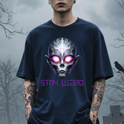 This Stay Weird alien shirt is for the cosmic misfits, the night-dwellers, and the ones who don’t just embrace their weirdness—they glorify it. Featuring a hauntingly detailed alien face with glowing eyes and third-eye vibes, this tee is equal parts spooky, surreal, and unapologetically bold.
