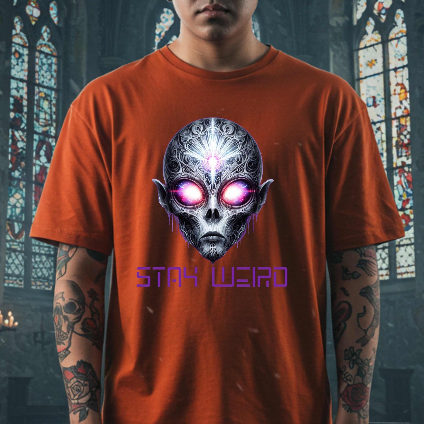 This Stay Weird alien shirt is for the cosmic misfits, the night-dwellers, and the ones who don’t just embrace their weirdness—they glorify it. Featuring a hauntingly detailed alien face with glowing eyes and third-eye vibes, this tee is equal parts spooky, surreal, and unapologetically bold.