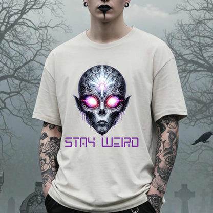 This Stay Weird alien shirt is for the cosmic misfits, the night-dwellers, and the ones who don’t just embrace their weirdness—they glorify it. Featuring a hauntingly detailed alien face with glowing eyes and third-eye vibes, this tee is equal parts spooky, surreal, and unapologetically bold.