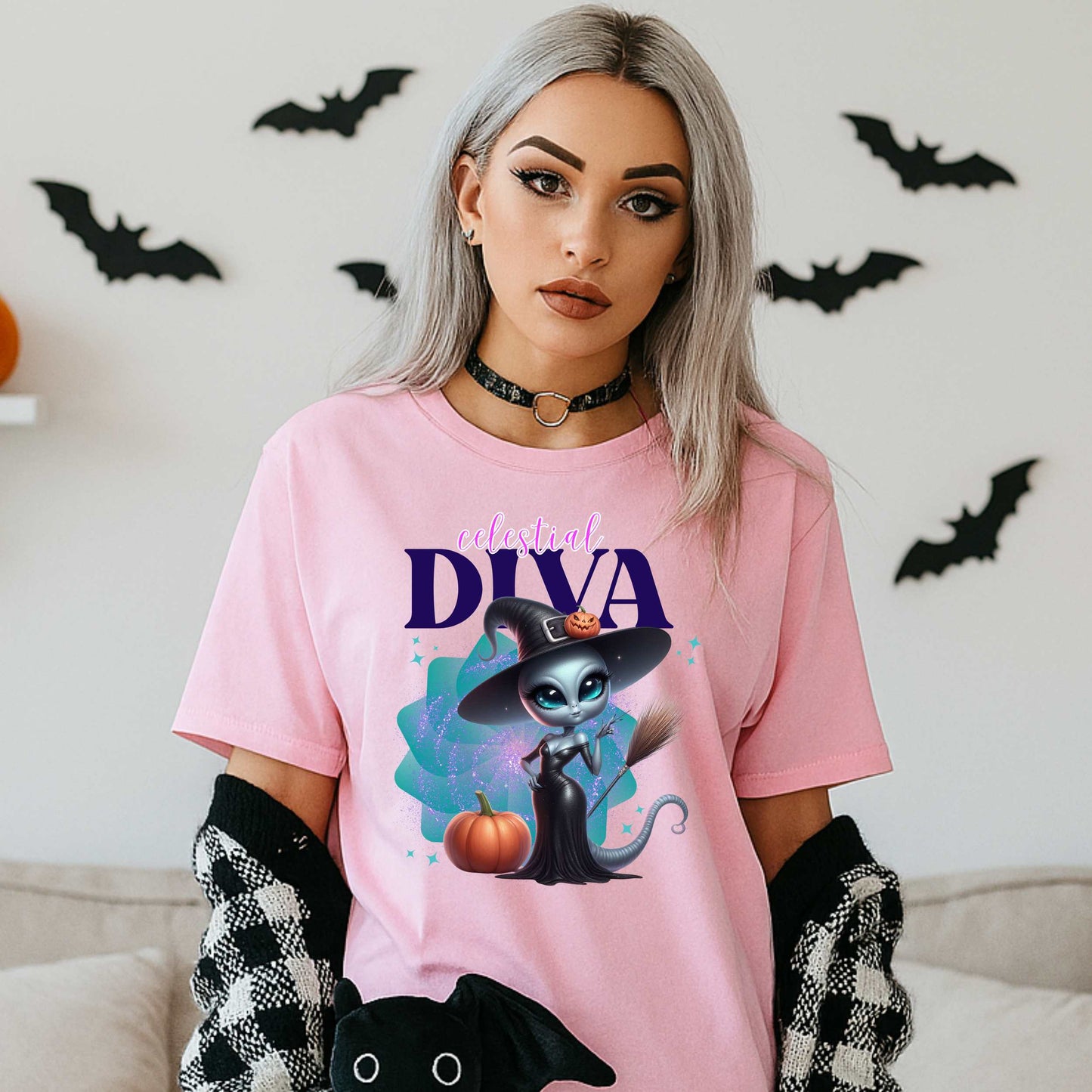 Celestial diva alien witch shirt for women who bring intergalactic glam to spooky season. This Halloween tee is for the extraterrestrial icon who’s too sparkly for Earth and too fabulous for just one galaxy. With a broom in one hand and zero chill in the other, this sassy alien is ready to haunt in heels. Perfect for fall parties, pumpkin patches, or just existing fabulously.&nbsp;