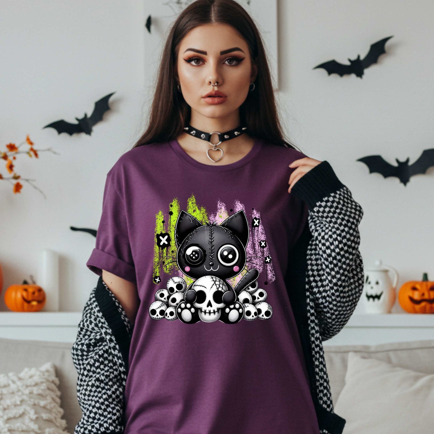 Pastel goth cat Halloween shirt for the spooky babe who wants to be cute, creepy, and slightly unbothered by your opinions. This little stitched-up kitten is sittin’ pretty on a pile of skulls, looking like she just clawed her way out of a haunted Lisa Frank binder. It’s soft, spooky, and a little sinister—just like your mood in October (and let’s be honest, year-round).&nbsp;