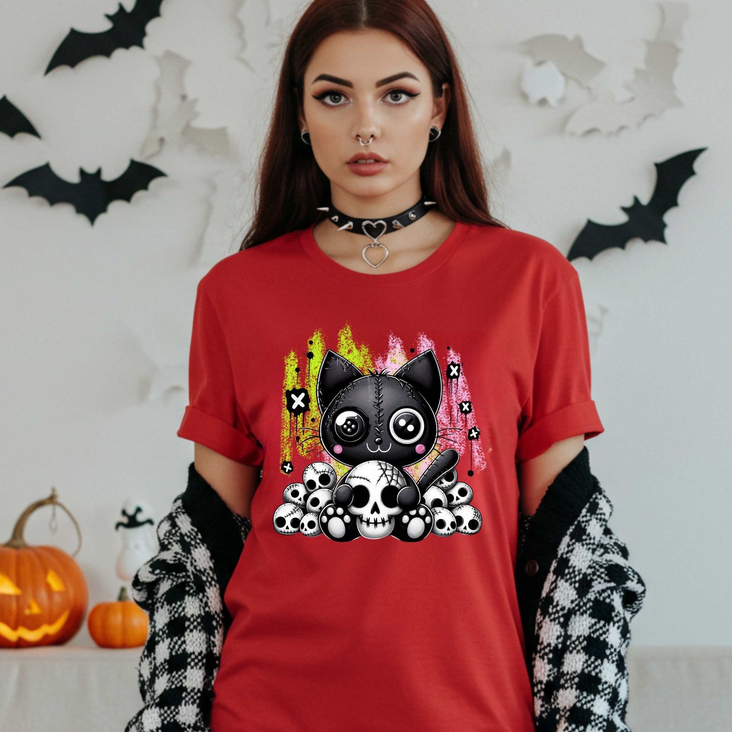 Pastel goth cat Halloween shirt for the spooky babe who wants to be cute, creepy, and slightly unbothered by your opinions. This little stitched-up kitten is sittin’ pretty on a pile of skulls, looking like she just clawed her way out of a haunted Lisa Frank binder. It’s soft, spooky, and a little sinister—just like your mood in October (and let’s be honest, year-round).&nbsp;