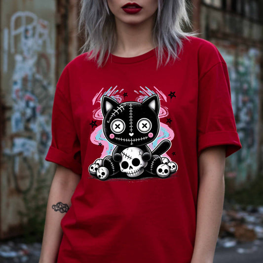 This pastel goth cat Halloween shirt is what happens when adorable meets unhinged. Featuring a stitched-up button-eyed kitten chillin’ on a throne of skulls like it's just another Tuesday, this tee is made for the spooky soul with a soft side (and a slightly murderous glare). Wear it to haunt the streets or just vibe in your villain era—either way, it’s a look.&nbsp;