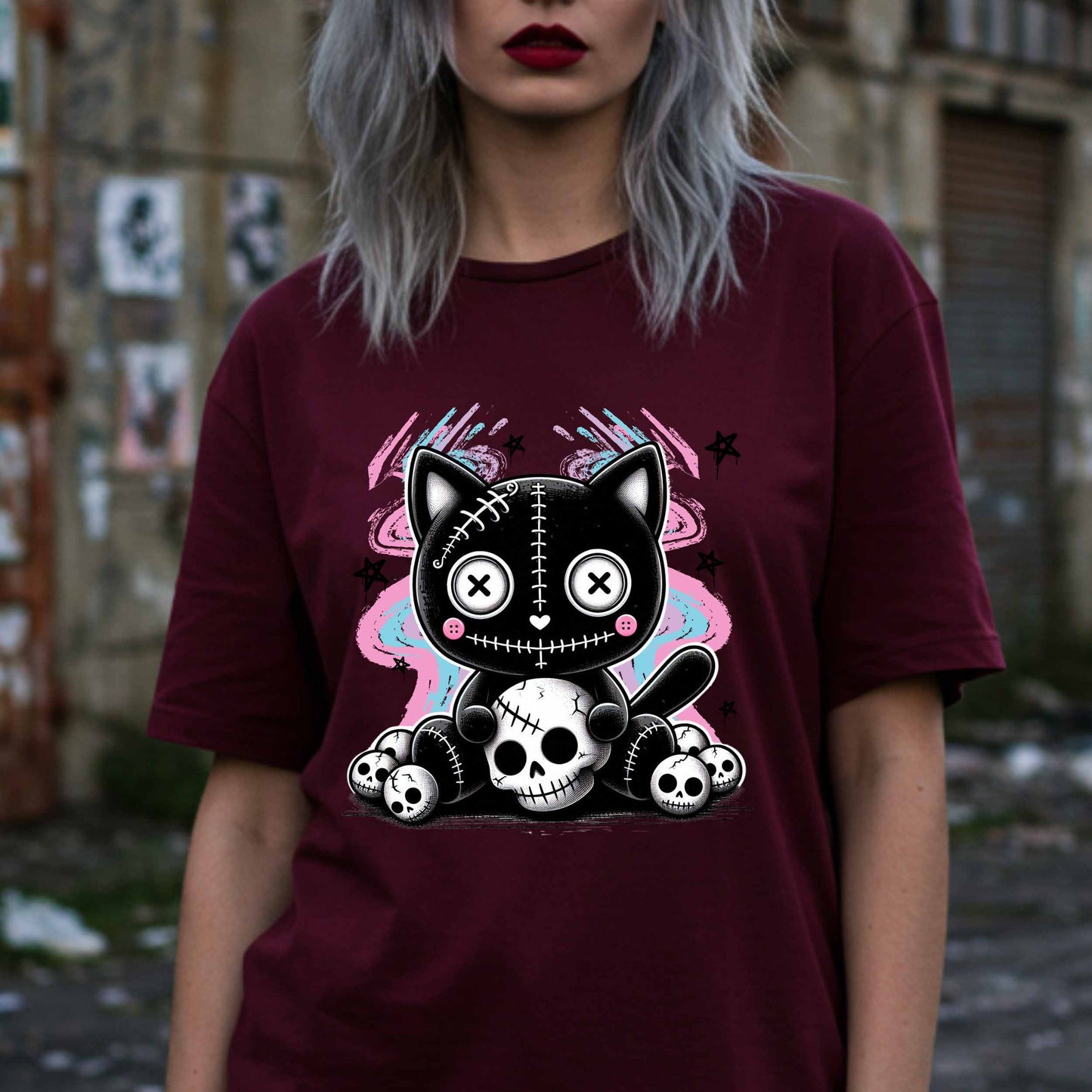 This pastel goth cat Halloween shirt is what happens when adorable meets unhinged. Featuring a stitched-up button-eyed kitten chillin’ on a throne of skulls like it's just another Tuesday, this tee is made for the spooky soul with a soft side (and a slightly murderous glare). Wear it to haunt the streets or just vibe in your villain era—either way, it’s a look.&nbsp;