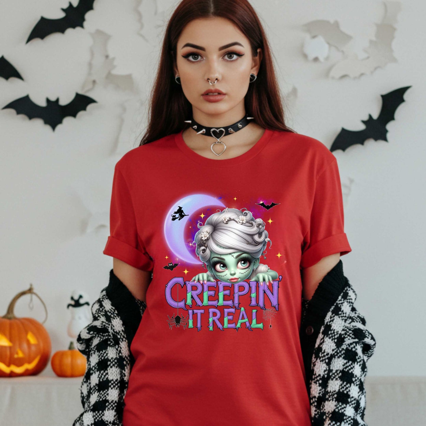 This funny Creepin’ It Real Halloween shirt is the perfect spooky tee for keeping it creepy, cute, and a little unhinged all spooky season long. Who needs subtle when you can be bold, undead, and sarcastically stylish? Whether you're haunting the living room or creeping through the Halloween party like a glam ghoul, this cute creepy graphic tee is a whole October mood. 