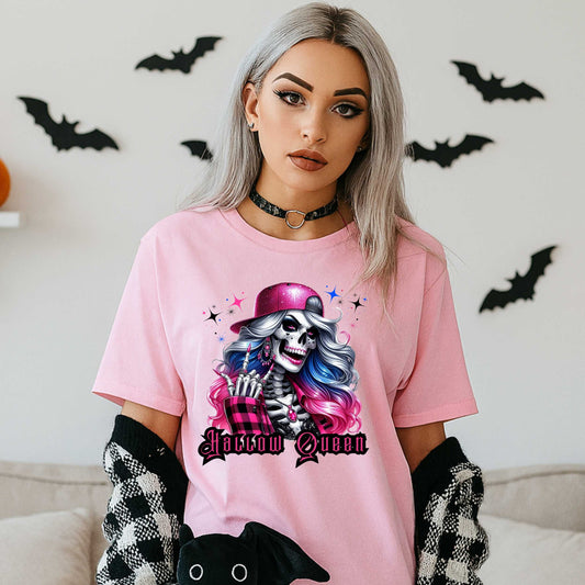 Featuring a glam skeleton with flowing pastel hair, pink flannel, and a glittery hat, she’s clearly been slaying the afterlife runway since 1802. Perfect for the girls who haunt with heels, sparkle under the moonlight, and don’t have time for basic. Serve full-body sass while you sashay through spooky season.