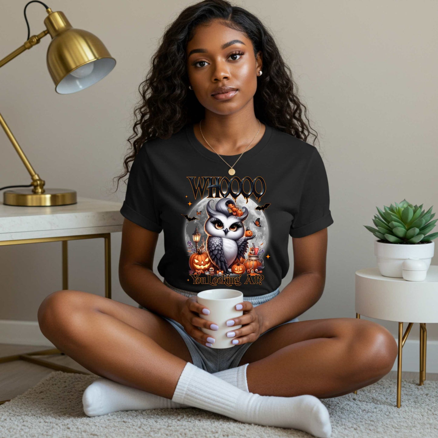Featuring a glam little night bird serving side-eye and spooky realness, this Halloween tee is equal parts adorable and attitude. Perfect for owl lovers, sass queens, and anyone who prefers their fall fashion with a little shade and a lot of pumpkins.