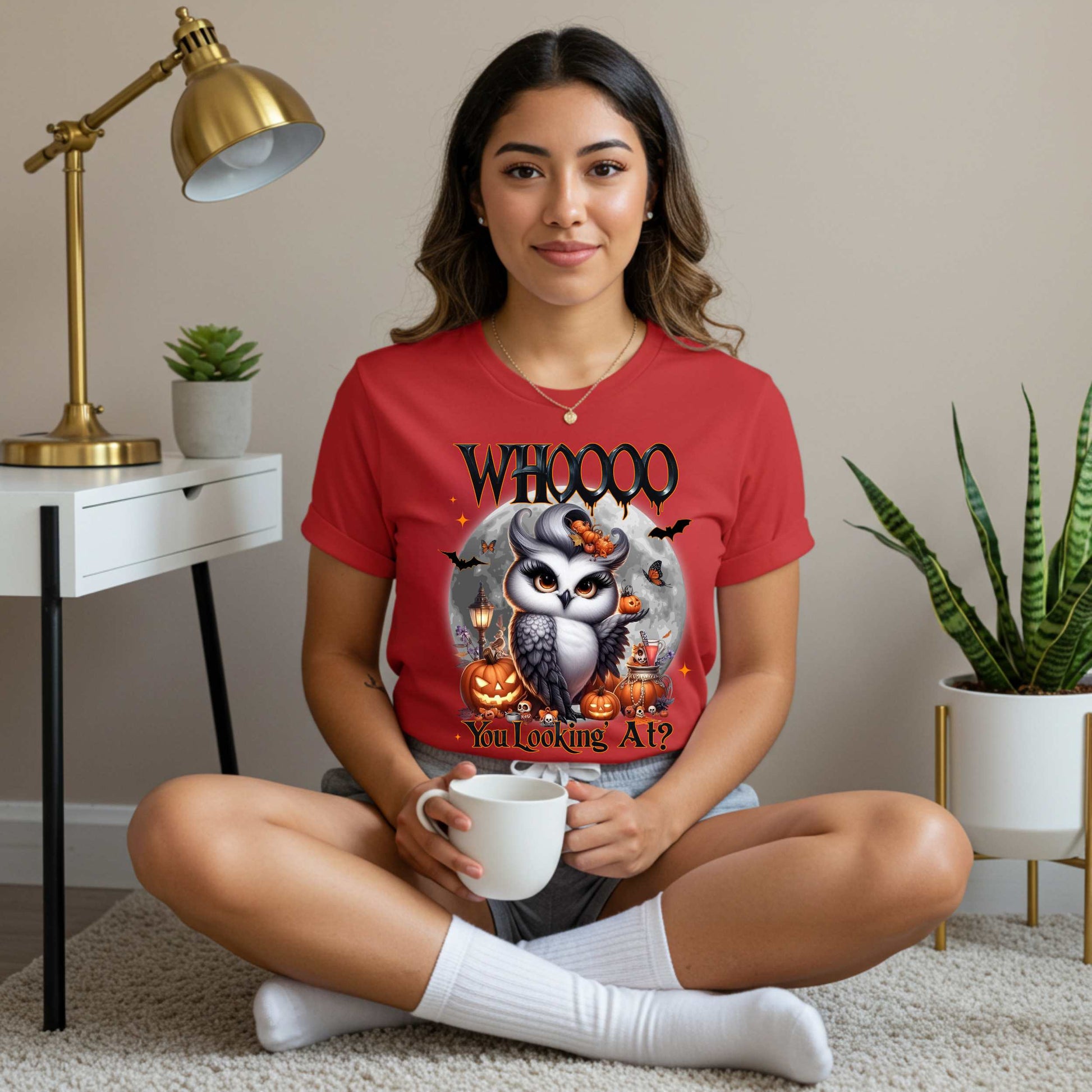 Featuring a glam little night bird serving side-eye and spooky realness, this Halloween tee is equal parts adorable and attitude. Perfect for owl lovers, sass queens, and anyone who prefers their fall fashion with a little shade and a lot of pumpkins.