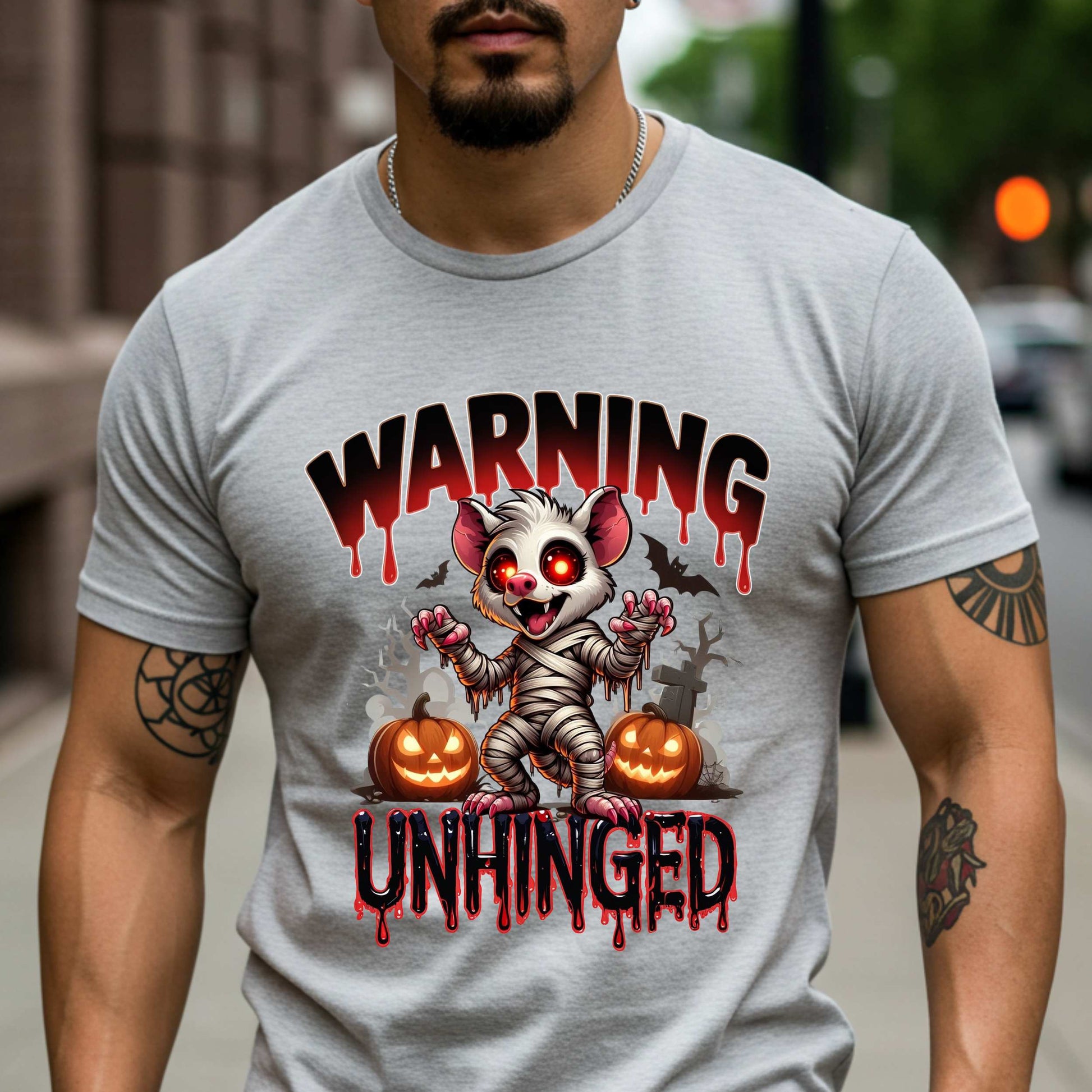 Wrapped in mummy rags with glowing red eyes and the energy of a sleep-deprived raccoon on espresso, this Warning: Unhinged tee is perfect for anyone who thrives on spooky vibes, sarcasm, and just a little bit of feral energy. Whether you're scaring off the normies or just embracing your inner mess, this is your new Halloween uniform.