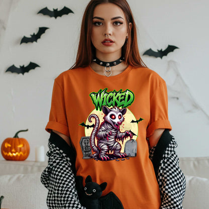 This unisex Wicked Opossum tee brings the perfect mix of spooky and unhinged. Great for horror fans, goth goblins, and anyone who appreciates a lil’ chaos with their candy corn.