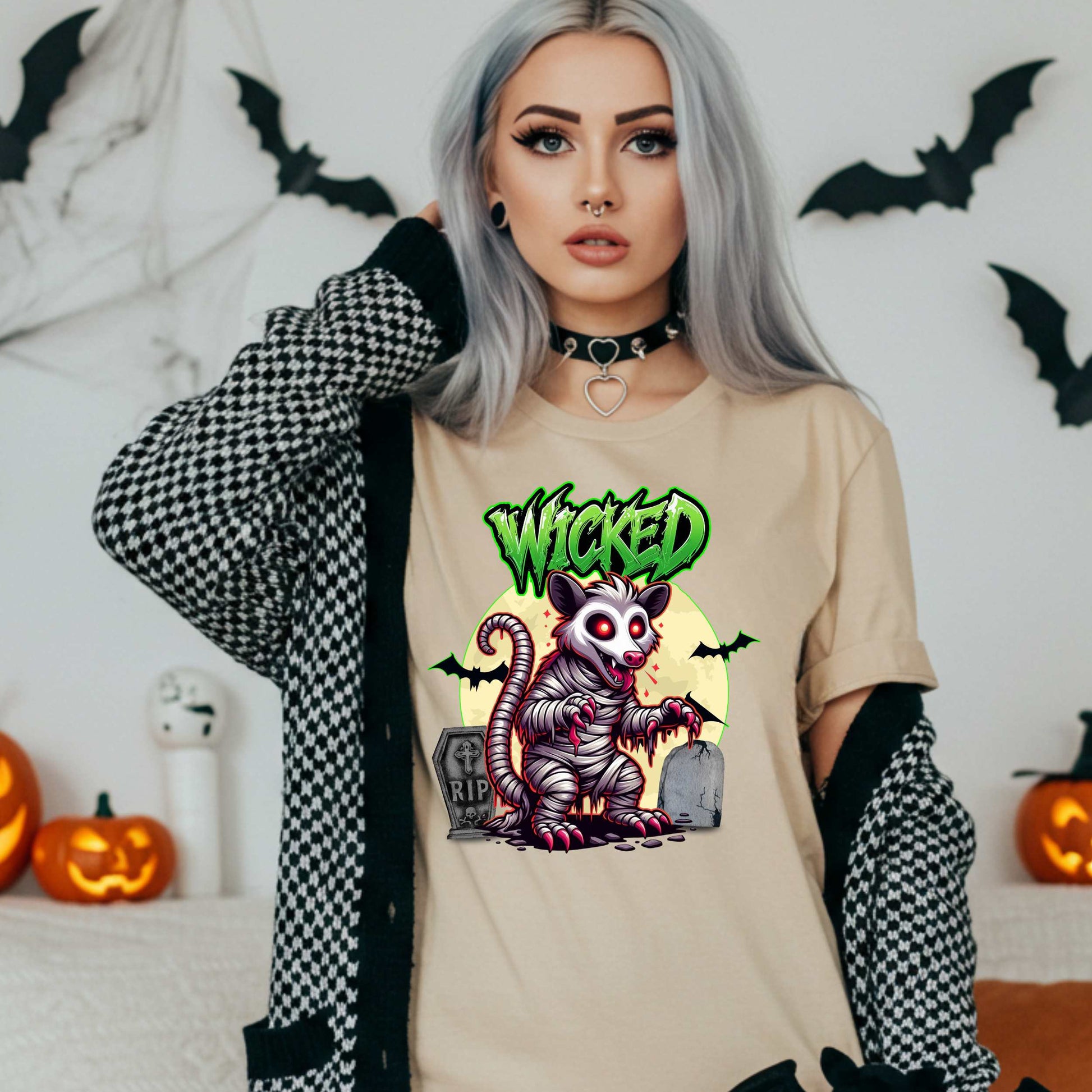 This unisex Wicked Opossum tee brings the perfect mix of spooky and unhinged. Great for horror fans, goth goblins, and anyone who appreciates a lil’ chaos with their candy corn.